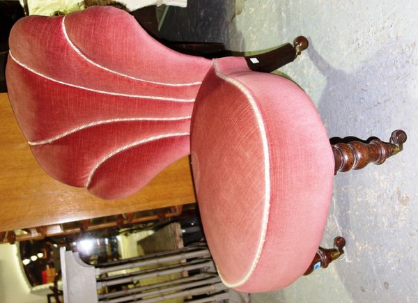 A 19th century pink upholstered shield back side chair.