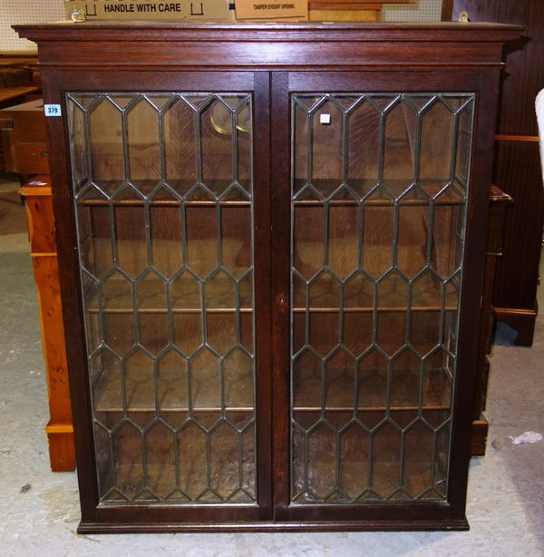 An early 20th century leaded glazed bookcase.