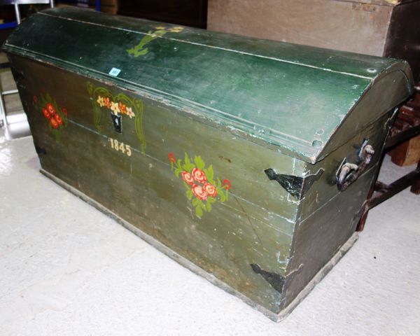 A 19th century green painted dome top trunk.