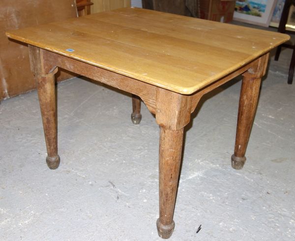 A 20th century oak rectangular dining table.