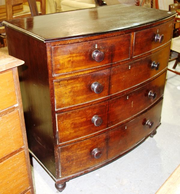 A Victorian mahogany bowfront chest of two short and three long drawers.