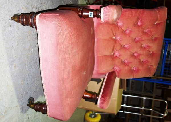 A 19th century mahogany framed pink upholstered low armchair.