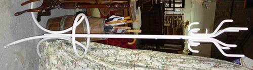 A 20th century white painted tubular hat and coat stand.