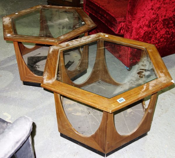 A pair of 20th century Danish style teak octagonal occasional tables. (2)