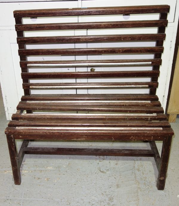 A 20th century stained oak luggage stand.