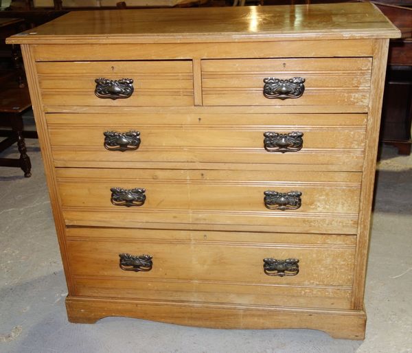 An Edwardian chest of two short and three long drawers.