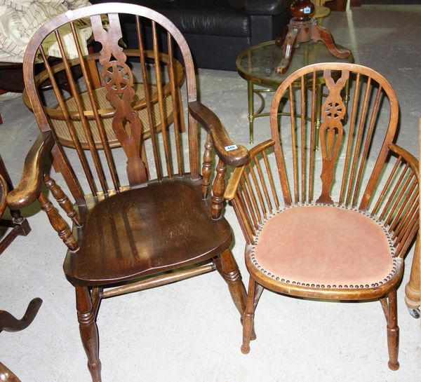 An ash and elm wheel back chair and another. (2)