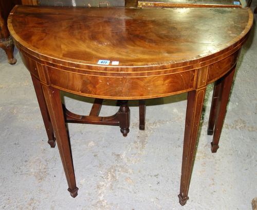 A 19th century mahogany and inlaid demi-lune card table.
