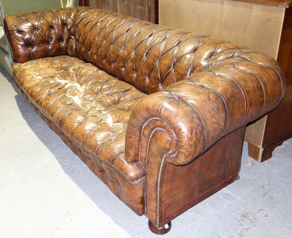 A brown Chesterfield sofa. (a.f)