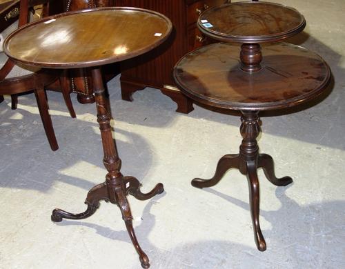A George III oak and mahogany dumb waiter, together with a mahogany tripod table. (2)