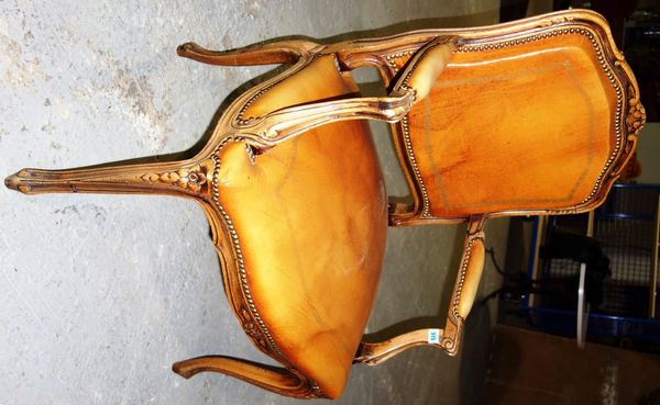 A Louis XV style open arm fauteuil.