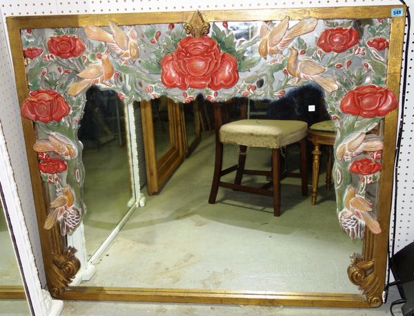 A rectangular mirror with applied carved decoration.
