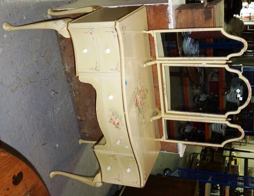 A 20th century yellow painted dressing table, and a triptych mirror. (2)