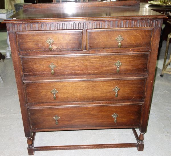 A 20th century oak chest of two short and three long drawers.