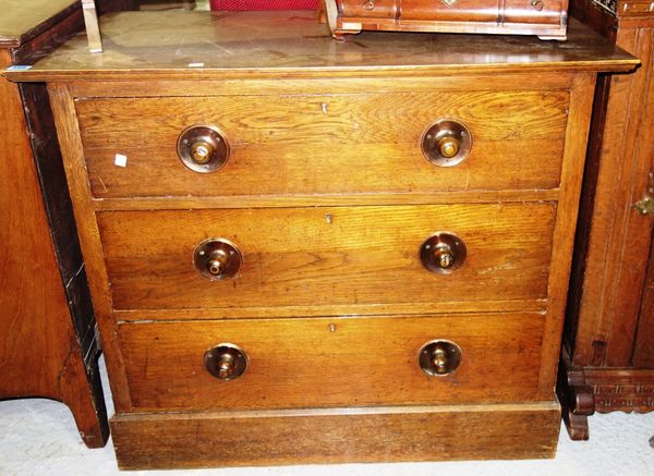 A 20th century oak three drawer chest.