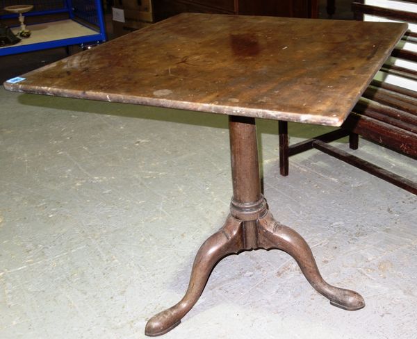 A 19th century mahogany square top tripod table.
