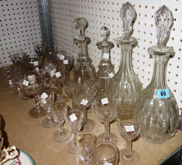 A quantity of Victorian and later cut glass, including drinking glasses and four decanters.