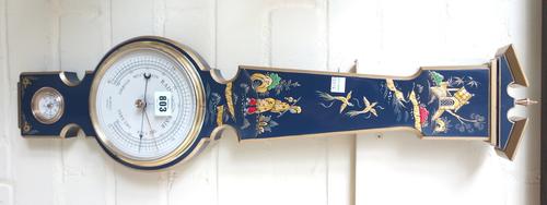 A modern chinoiserie decorated wheel barometer by Russell Norwich, 68cm high, and a 1920's oak cased wheel barometer with applied brass presentation p