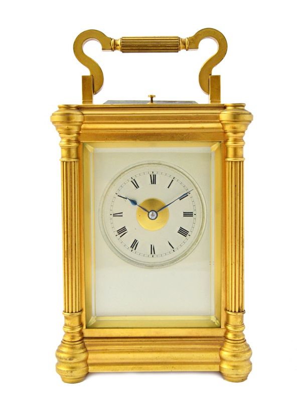 A French gilt brass cased hour repeating carriage clock, early 20th century, with pillar supports, plain silvered dial plate and a two train movement,