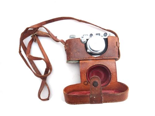 A Leica D.R.P. camera, no.198538, with a Summar lens, filters, lens extenders and accessories.