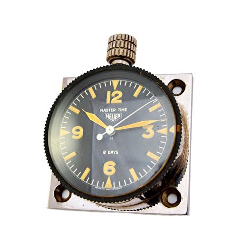 A Heuer eight day Master-Time clock, rally spec, circa 1963, 5.8cm wide.  Illustrated