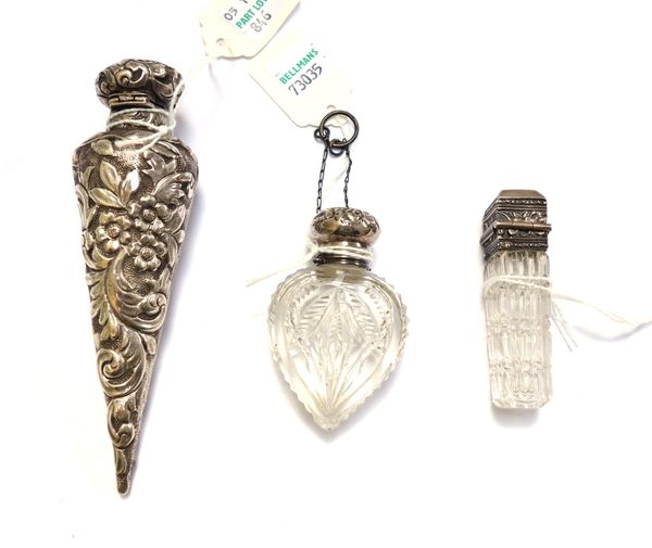 A Continental glass and silver mounted scent bottle, early 20th century, stamped '800', of square cut glass form, with a hinged lid, 6.5cm, together w