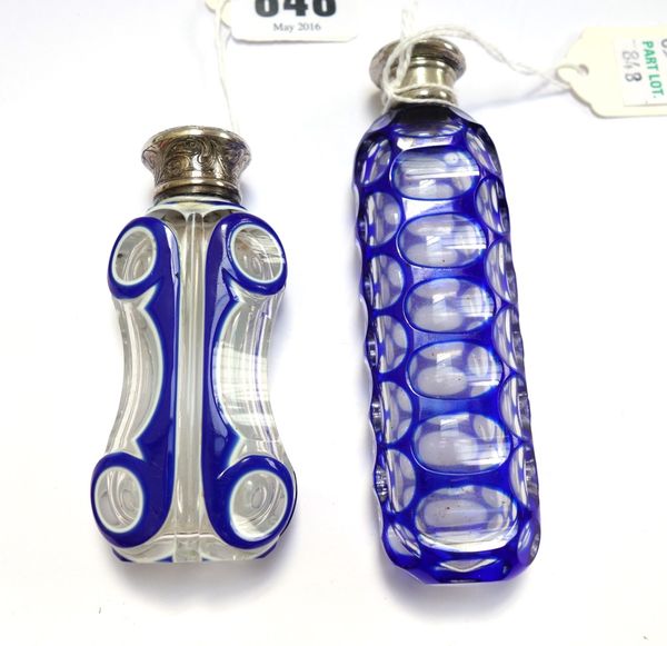 A Victorian blue flashed cut glass scent bottle with white metal screw cap, 11.2cm, and a blue and white enamel overlaid cut glass scent bottle, with