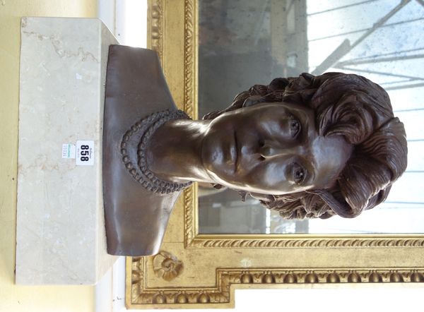 A bronze portrait bust depicting a female subject, signed and dated March 1989 to the rear, on a marble plinth, 47cm high.