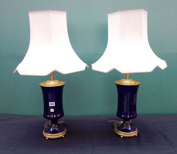 A pair of Bristol blue glass table lamps, 20th century, with gilt brass mounts, 36cm high excluding fittings and shades. (2)
