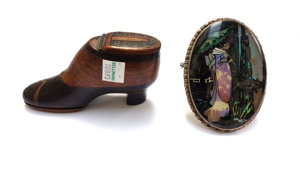 A Victorian mahogany and ebonised novelty snuff box modelled as a heeled shoe, pique work inlaid and dated 1878, 11cm wide, together with a silver str