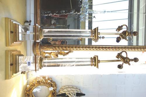 A pair of rock crystal table lamps, with turned columns on brass mounted square bases, 60cm high, (2).