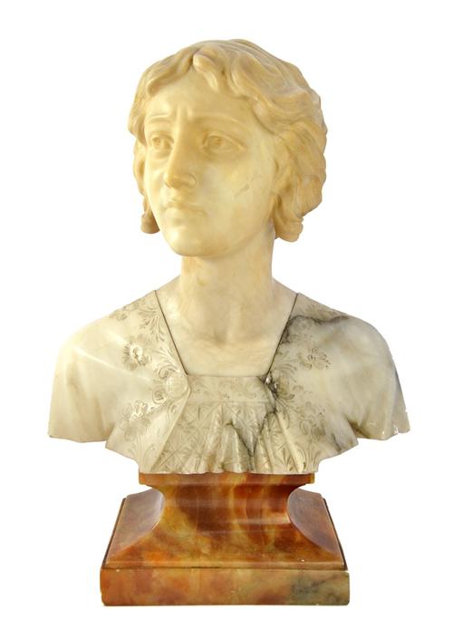 A white marble bust of a young woman, circa 1920, on a variegated marble base, unsigned, 44cm high overall.  Illustrated