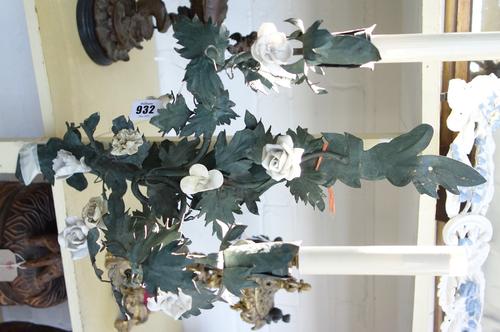 A set of four green painted tin and porcelain mounted two branch wall lights, late 20th century, each of naturalistic foliate design, backplate 60cm,