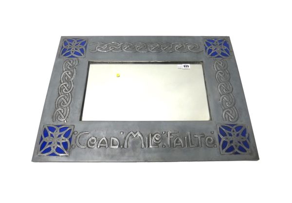 An Arts and Crafts pewter mirror, circa 1900, of rectangular form, decorated with embossed Celtic entrelacs, inscribed 'Cead. Mile. Failte' and with e