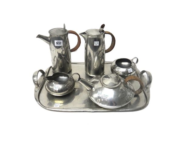 Solkets for Liberty & Co, a Tudric pewter tea set, early 20th century, comprising; a teapot with a wicker handle, decorated in relief with honesty pla