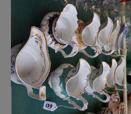 A Liberty & Co five piece silver dressing table set, hallmarked for Birmingham 1911-12, comprising; three brushes, 27cm long, a comb and a button hook