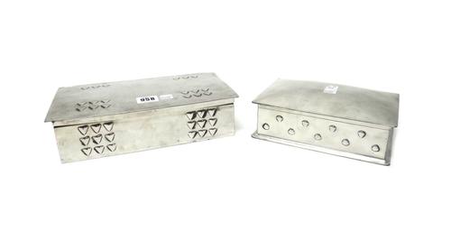 A Liberty & Co Tudric pewter cigarette box with embossed Art Nouveau design, numbered 0129, 27cm wide, and another English pewter encrier box, numbere