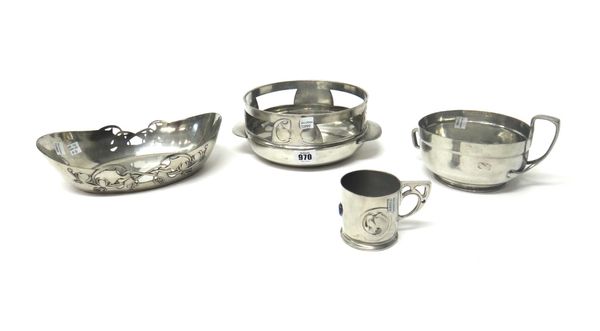 An English pewter Tudric style cup holder with enamel cabochon, numbered 0358, 6.5cm high, together with a Tudric pewter two handled bowl with openwor