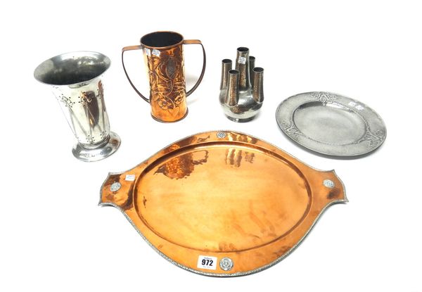 A Keswick copper two handled tray of oval form, with all over beaten finish, numbered 2439, 51cm across the handles, together with a Hutton pewter pla