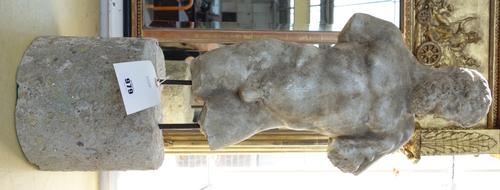 A marble figure, after the antique, carved as a Herculean male on a later circular stone base, 65cm high.