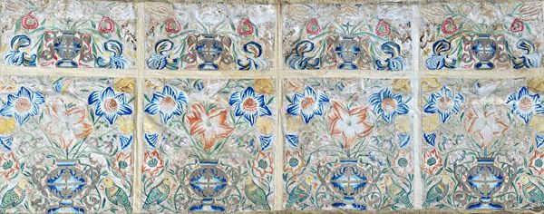 A silk and metal thread embroidered altar panel, 18th century, each panel with a vase filled with naturalistic flowers, insects and pairs of green par