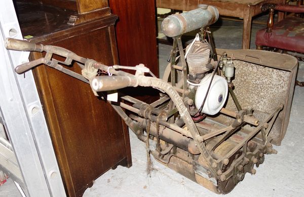 An early 20th century "ATCO" petrol power lawn mower fitted with Villiers engine. This item is sold as seen.   M1