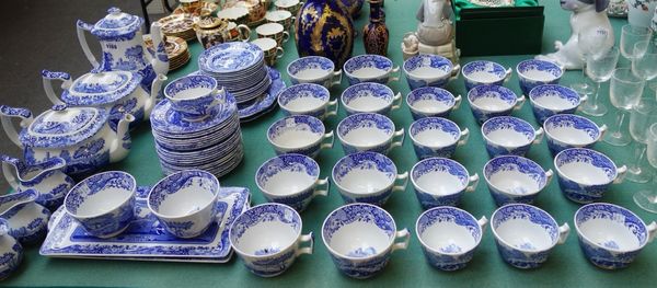 A Spode 'Italian' pattern part tea service, 20th century, comprising; two teapots and covers, a coffee pot and cover (22cm high), two sugar bowls, thr