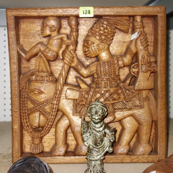 LO FAKEYE a mid-20th century carved panel, two ebony face masks of African man and woman, a small metal figure and two red face masks. (6) S2T