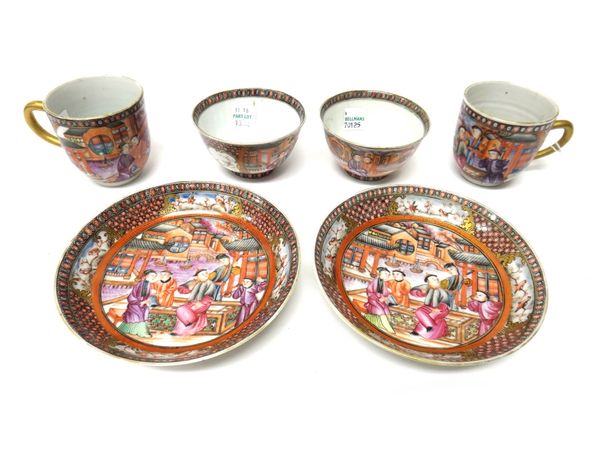 A pair of Chinese mandarin palette trios, Qianlong, each comprising a coffee cup, teabowl and a saucer, well painted with figures at leisure against a