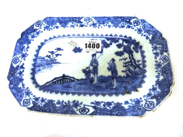 A Chinese export blue and white small canted rectangular serving dish, Qianlong, painted with two figures on a riverbank, inside an elaborate border,