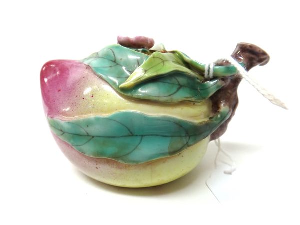 A Chinese porcelain water dropper, 19th/20th century, in the form of a peach with branch moulded spout, the cover with prunus flower knop, 5cm. high.