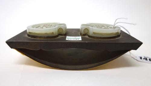 A Chinese jade mounted enrgraved metal desk blotter, 19th/20th century, engraved with dragons and flowers, inset with white jade carved and pierced be