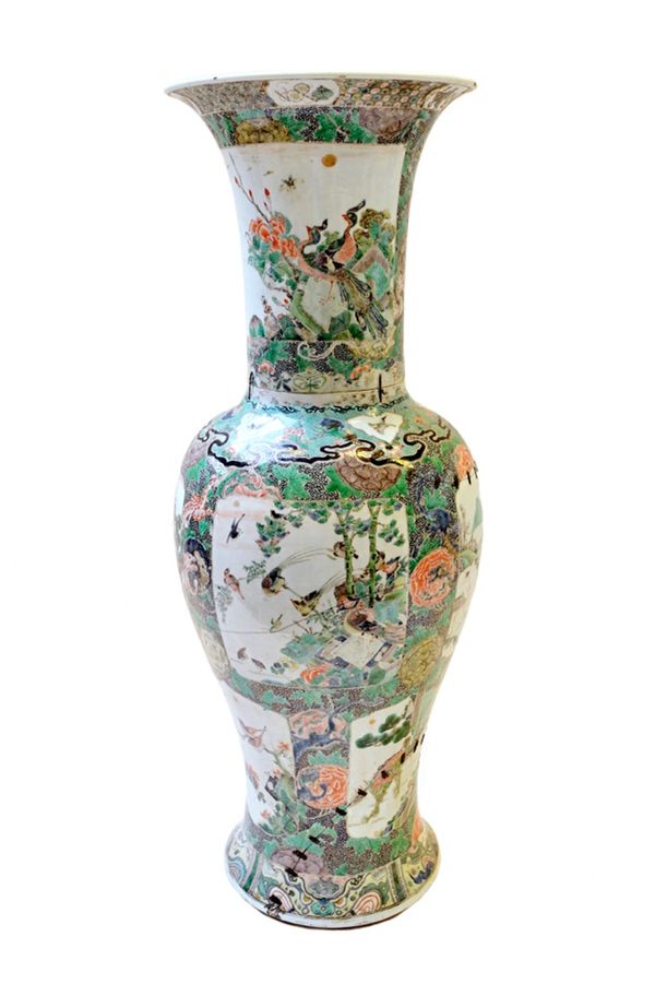 A large famille-verte yen-yen vase, Kangxi, painted with panels of birds, mythical beasts and landscapes, (a.f), 73cm high. Illustrated.