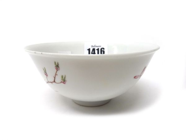 A Chinese famille-rose bowl, red painted Guangxu six character mark, delicately painted with flowering peony, 11.5cm. diameter.